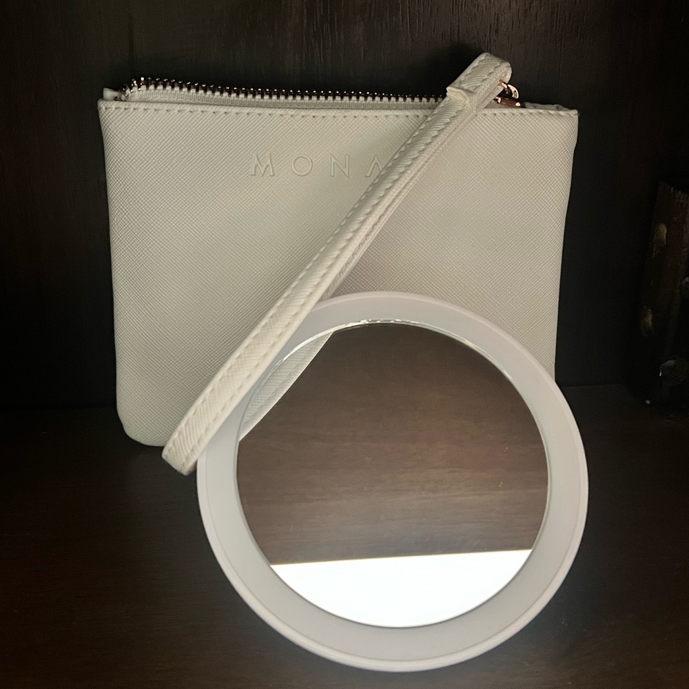 Monat mini LED light vanity mirror and wristlet